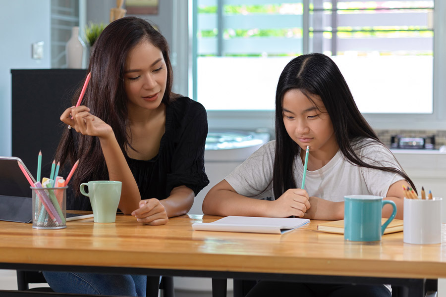 student and tutor together at a desk in Burbank